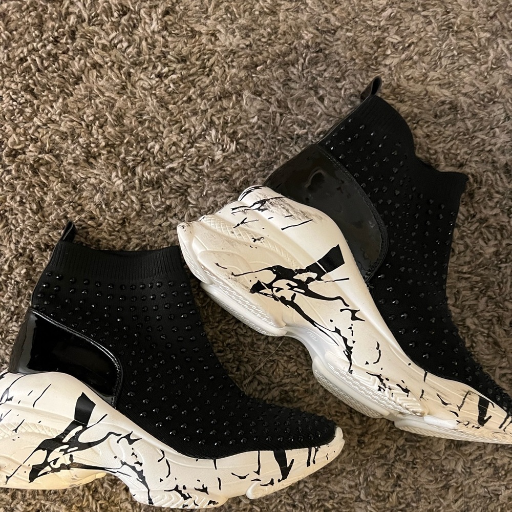 Wsekesip slip on wedge sneaker.  Maybe worn one time.   Excellent condition